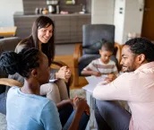 Family at home with mental health professional, discussing their problems