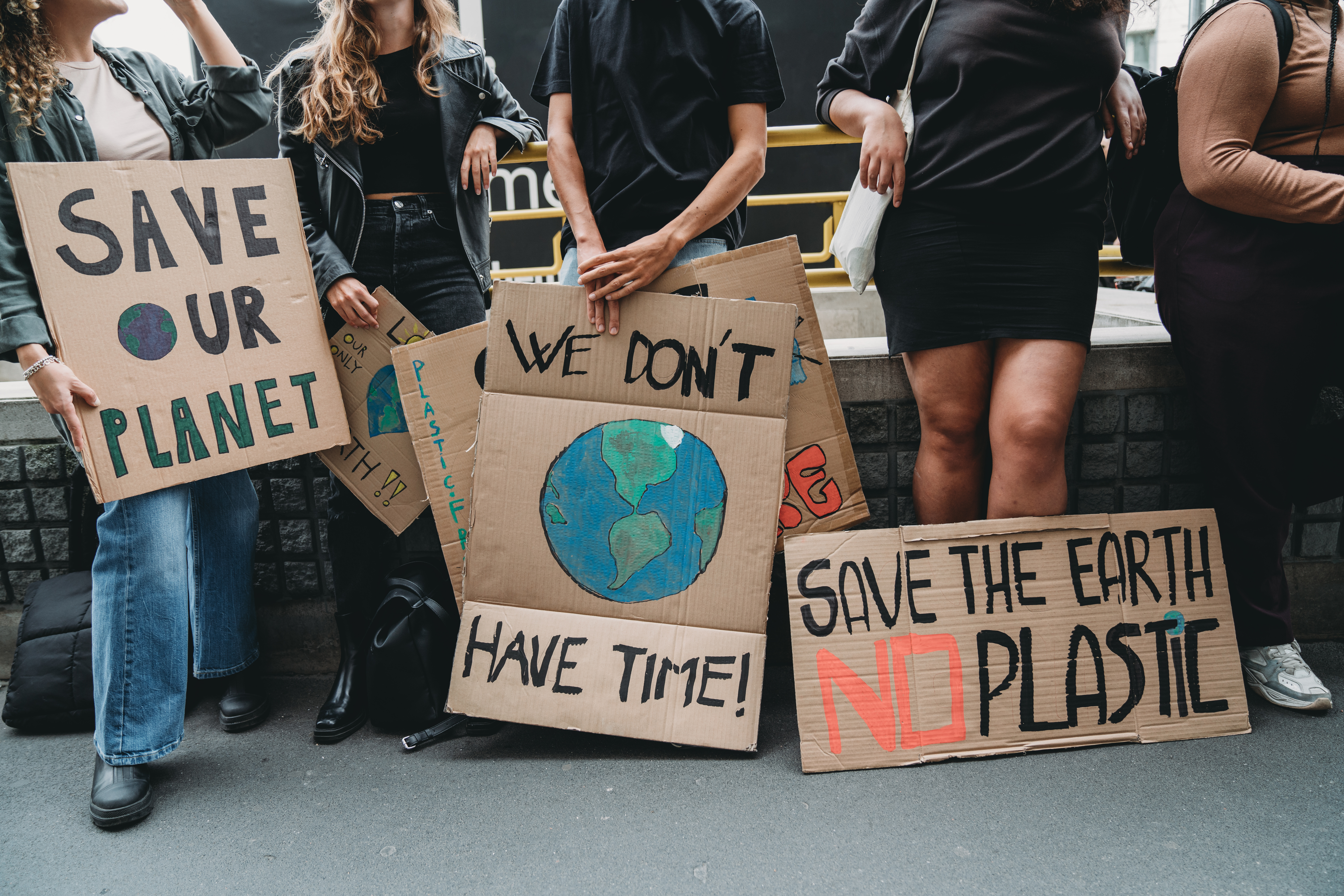 People holding signs at a protest