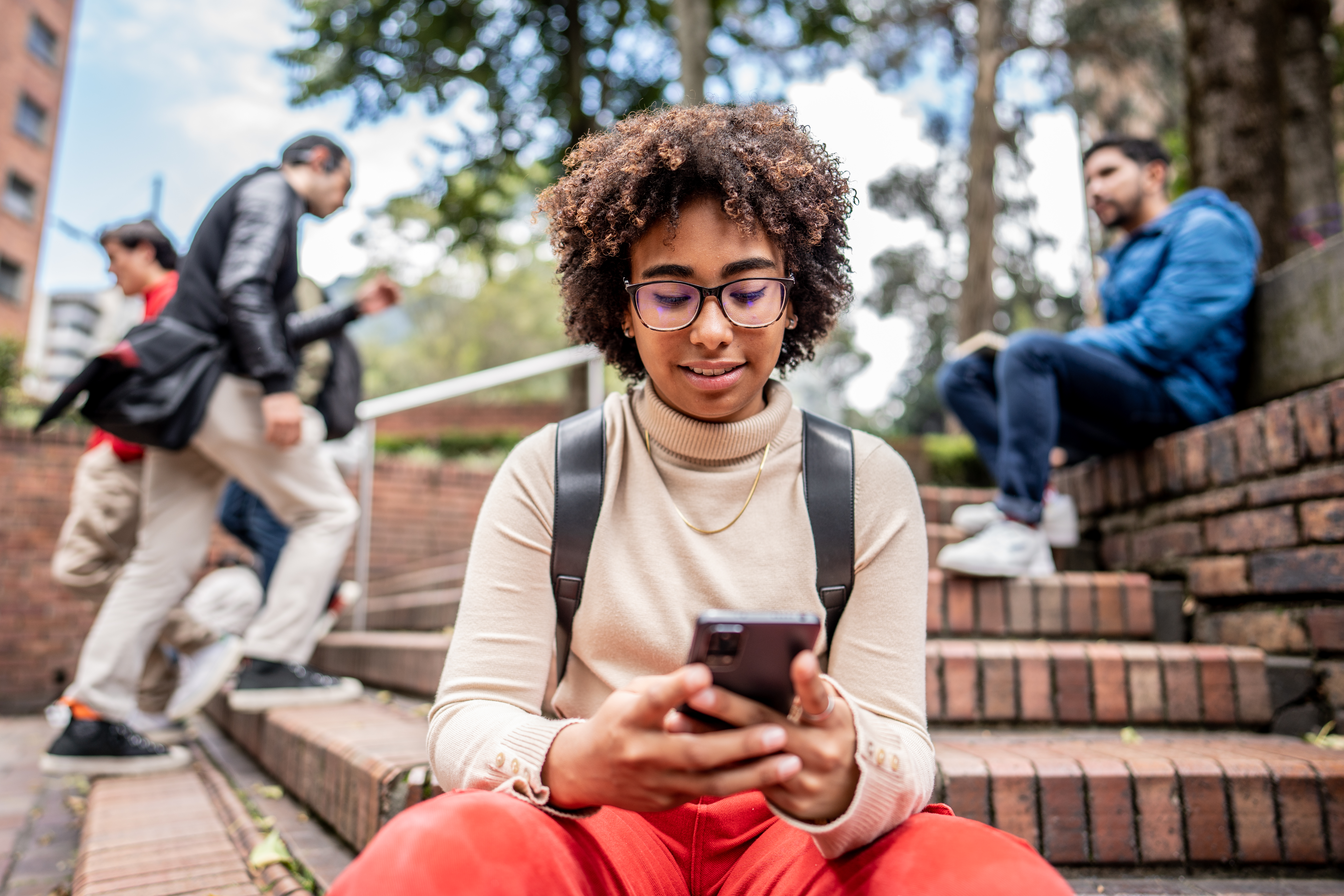 Young woman texting on a mobile phone