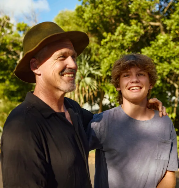 Father and son sharing a moment of affection in Australia