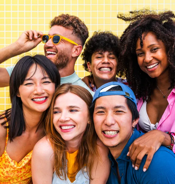 Multicultural cheerful people with summer clothes enjoying summer holidays, concepts about youth, friendship and positive emotion