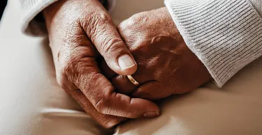 Close up of senior hands.