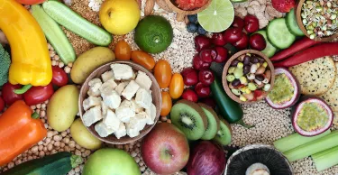 Photo of fruits, vegetables and dips - vegan plant based health food for fitness