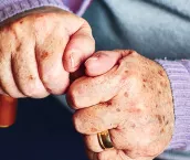 Close up of senior hands.