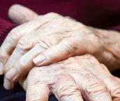 Close up of senior hands.