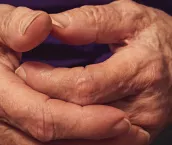 Close up of senior hands.