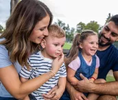 Portrait of a happy young family with two children, son and a daughter