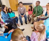 Conference or meeting with elementary school teachers students and parents