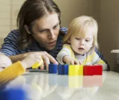 Father (30s) with two young children (18 months and 2 years). Father (30s) with two young children (18 months and 2 years).