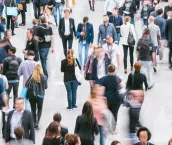 street view of pedestrians with blurred out faces.