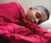 Image of a young teenager sleeping