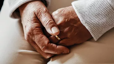 Close up of senior hands.