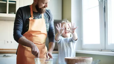 dad cooking with child