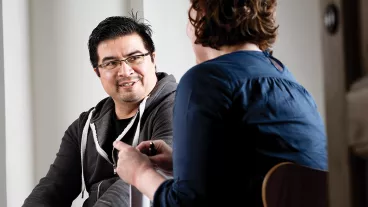 Mid 40's Male Taking Part In a Counselling Session Mid 40's Male Taking Part In a Counselling Session