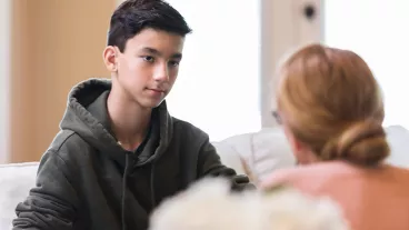A young boy is caught cheating, and his unrecognizable mom appeals to his better nature, but he remains angry. A young boy is caught cheating, and his unrecognizable mom appeals to his better nature, but he remains angry.