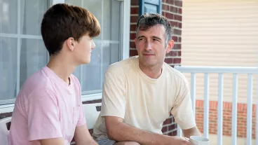 Father and Son having a serious conversation