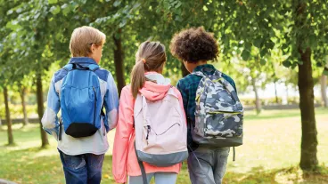 Rear photo of children going to school.