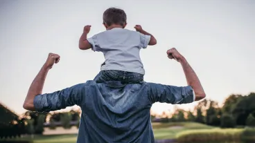 Dad and toddler son outdoors
