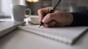 Taking notes on a ring binded notepad