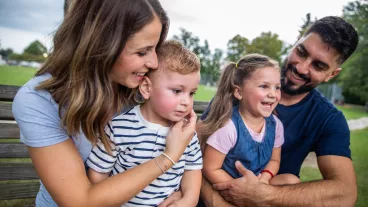 Portrait of a happy young family with two children, son and a daughter