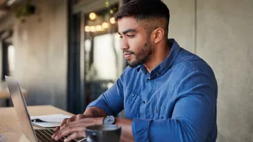 Worker, thinking or typing on laptop in cafe, coffee shop or restaurant on startup ideas, vision or web design ux. 