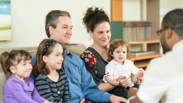 Family in a therapy session.
