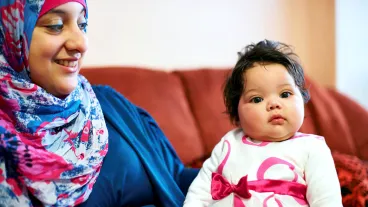 Shot of a muslim mother and her little baby girl