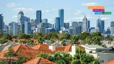 Melbourne city skyline in the distance and house roofs in the foreground