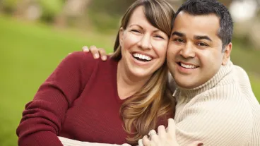 Attractive Mixed Race Couple Portrait in the Park.
