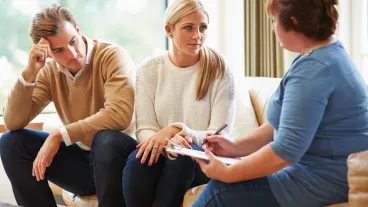 Counselor Advising Couple On Relationship Difficulties